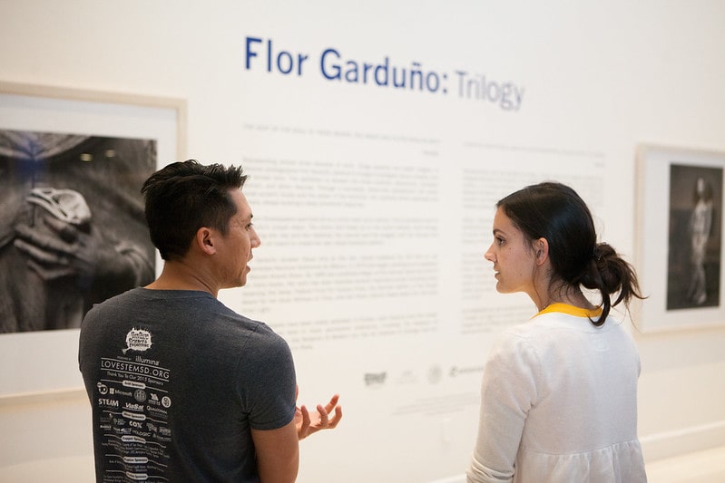 Two visitors in discussion in the MOPA galleries